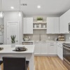 Stainless steel appliances in kitchen at Bainbridge Avenues Walk apartments