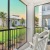 screened-in patio of a Jacksonville apartment at Bainbridge Avenues Walk